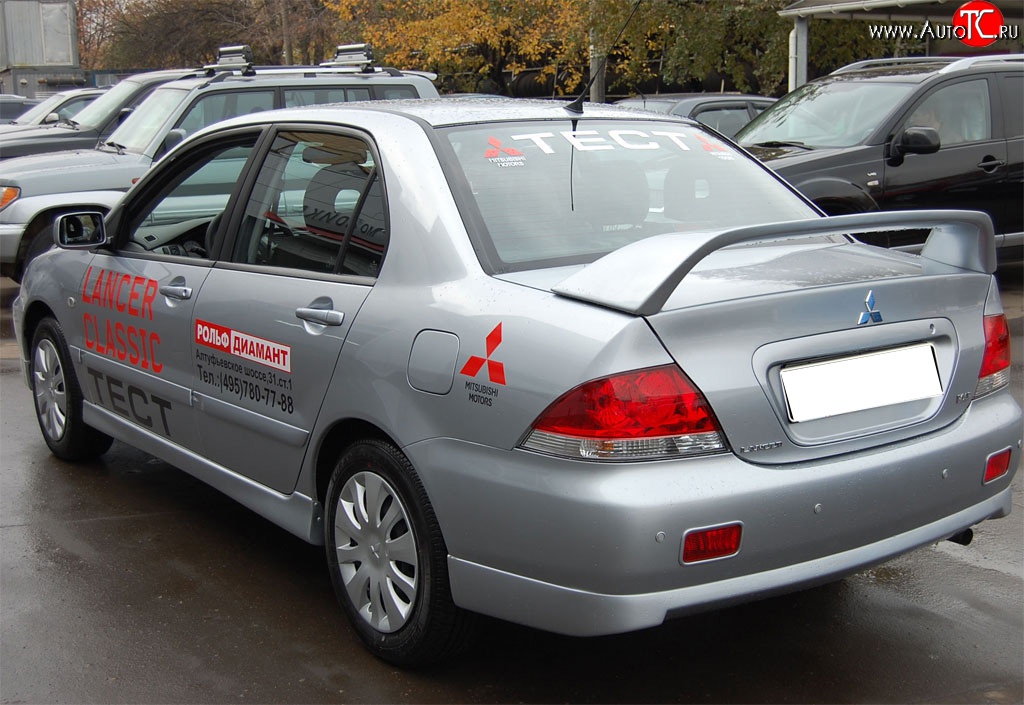 4 249 р. Накладка заднего бампера GT Dynamics Mitsubishi Lancer 9 2-ой рестайлинг седан (2005-2009) (Неокрашенная)  с доставкой в г. Горно‑Алтайск