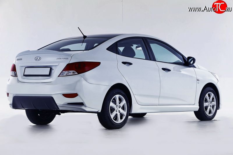 14 499 р. Задний бампер Sport Hyundai Solaris RBr седан дорестайлинг (2010-2014) (Неокрашенный)  с доставкой в г. Горно‑Алтайск