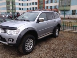 15 349 р. Накладки на колёсные арки BUSHWACKER Mitsubishi Pajero Sport PB дорестайлинг (2008-2013) (Неокрашенные)  с доставкой в г. Горно‑Алтайск. Увеличить фотографию 2