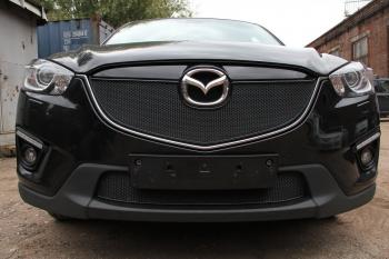 799 р. Зимняя заглушка решетки радиатора (с парктроником) PREMIUM Стрелка11 Mazda CX-5 KE дорестайлинг (2011-2014) (черная)  с доставкой в г. Горно‑Алтайск. Увеличить фотографию 2